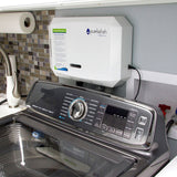 Side view of the pureWash Pro X2 installed on a standard laundry machine.
