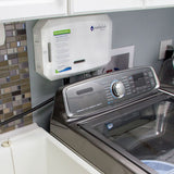 Side view of the pureWash Pro X2 installed on a standard laundry machine.